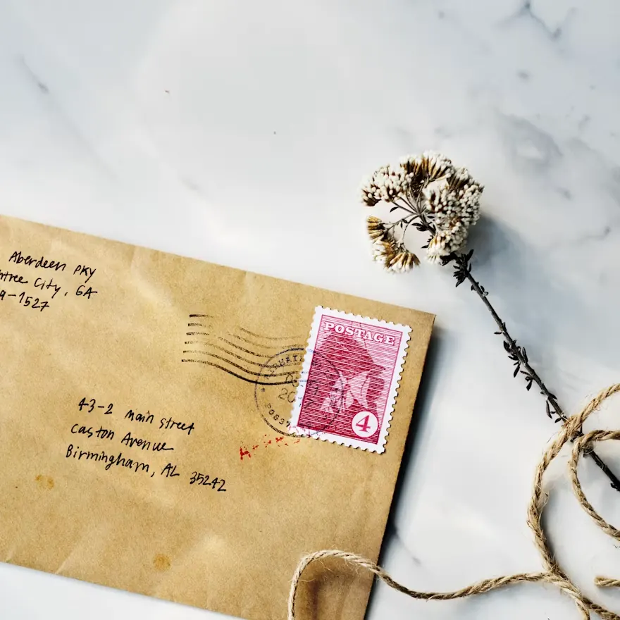 Handwritten letter and postage stamp